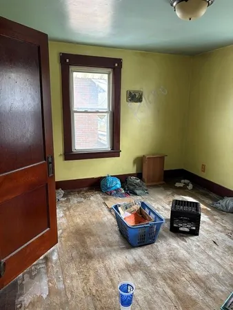 a room with furniture and a window