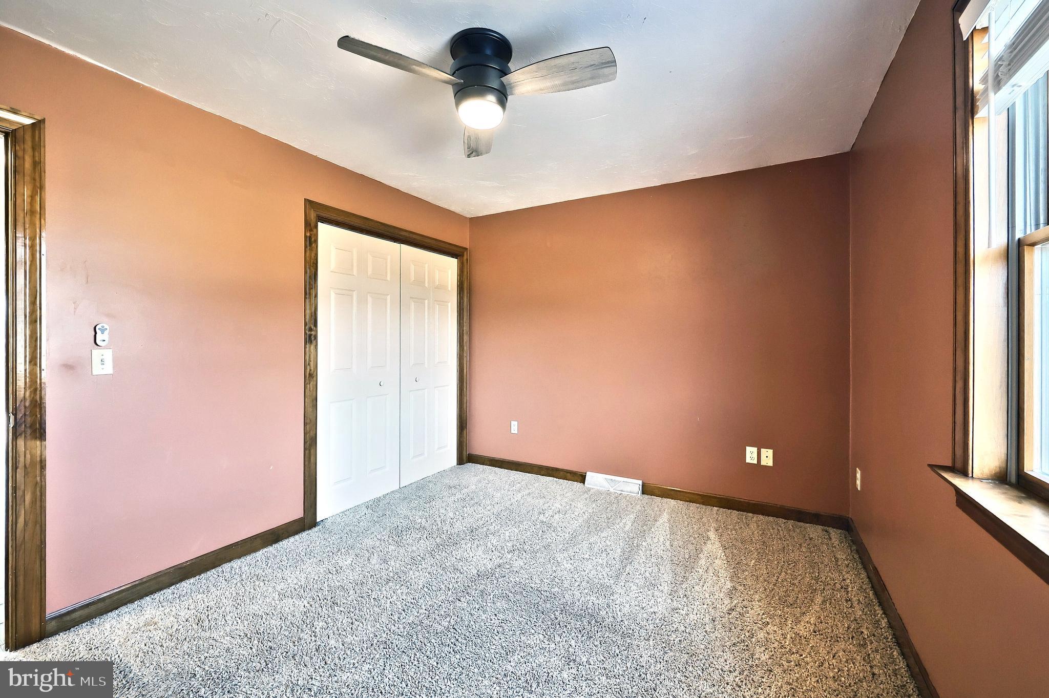 90 Vida Lane Dover, PA 17315 - Photo 23 of 59 a view of a livingroom with a ceiling fan and window