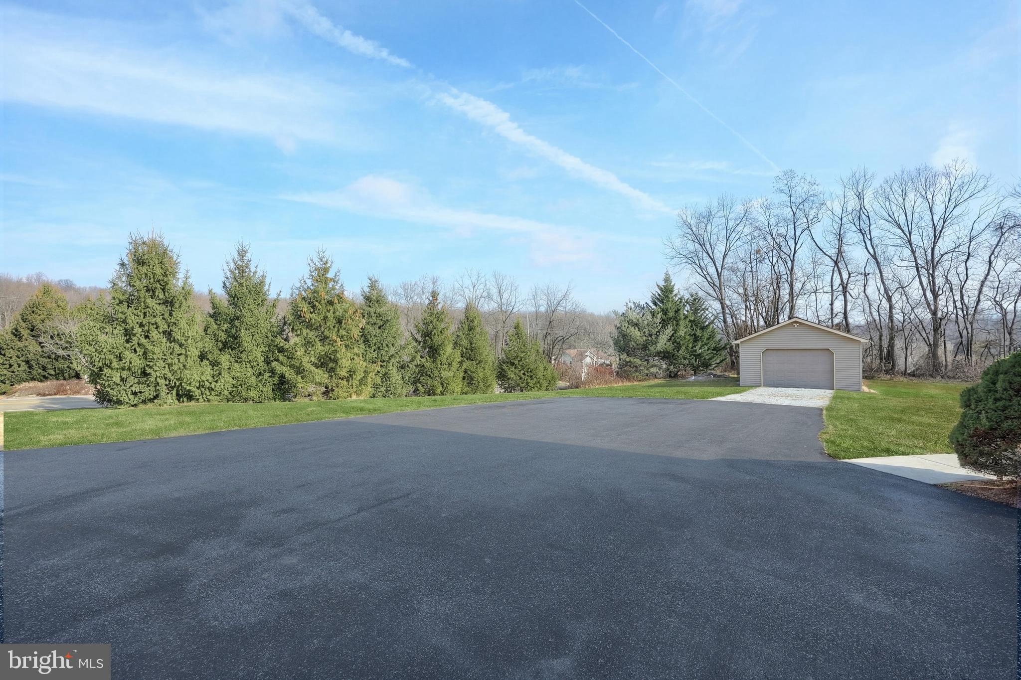 90 Vida Lane Dover, PA 17315 - Photo 42 of 59 a view of a field with plants and trees