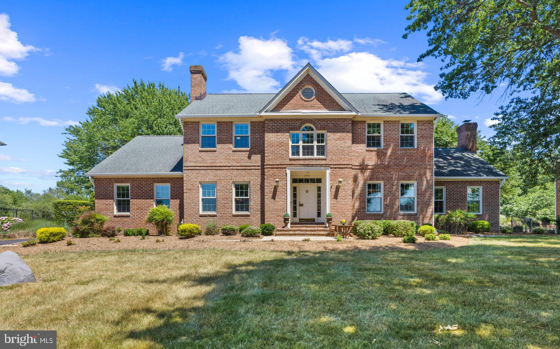 3403 Hidden River View Road Annapolis, MD 21403 - Photo 4 of 50 a front view of a house with a yard