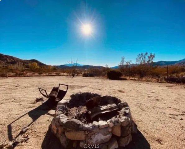 a view of a lake with a mountain