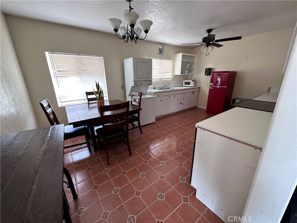 8960 South Samel Road Morongo Valley, CA 92256 - Photo 4 of 13 a view of a kitchen and microwave