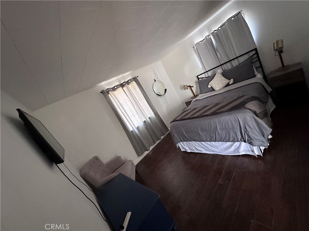 8960 South Samel Road Morongo Valley, CA 92256 - Photo 7 of 13 a view of walk in closet with clothes and shoes