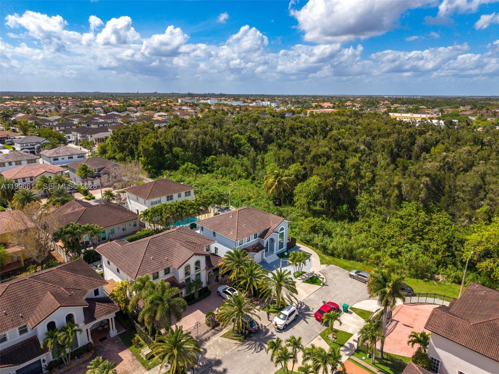3002 Southwest 147th Court Miami, FL 33185 - Photo 14 of 97 an aerial view of multiple house