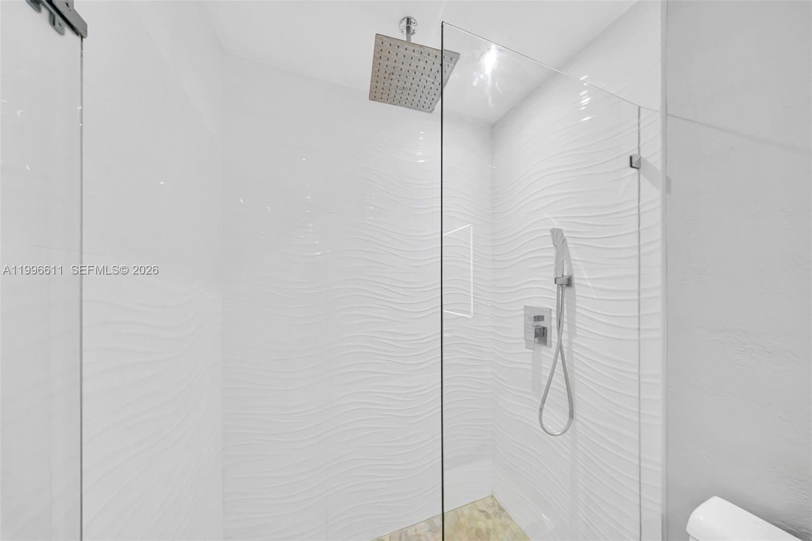 3002 Southwest 147th Court Miami, FL 33185 - Photo 25 of 97 a bathroom with a shower and a shower