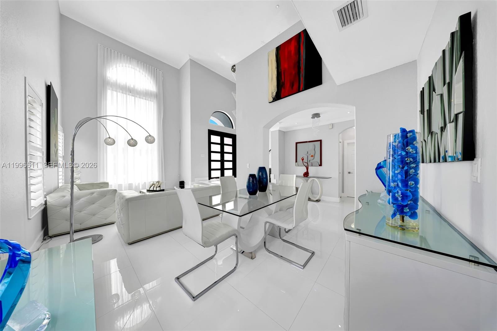 3002 Southwest 147th Court Miami, FL 33185 - Photo 30 of 97 a living room with furniture fireplace and flat screen tv