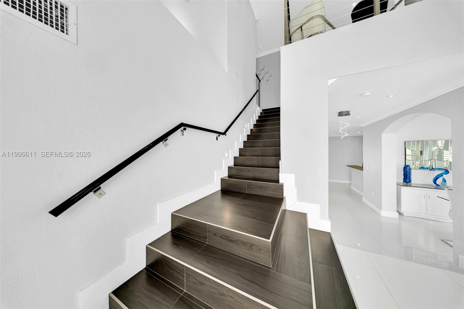 3002 Southwest 147th Court Miami, FL 33185 - Photo 46 of 97 a view of entryway and hall