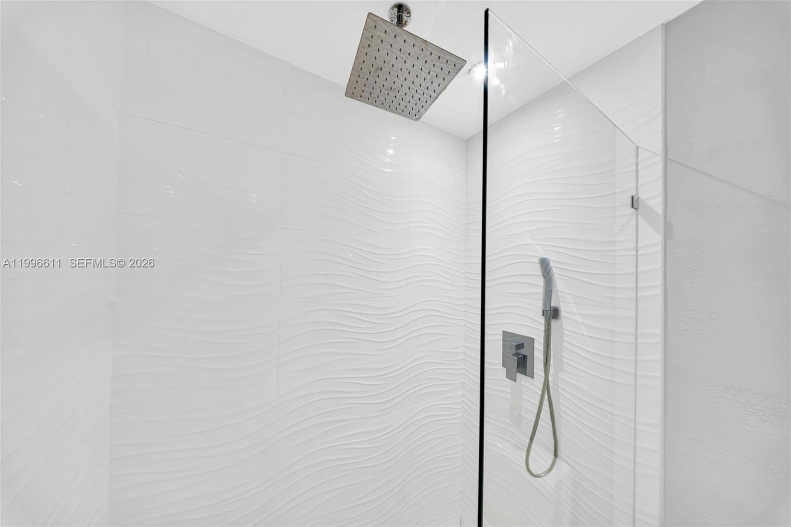3002 Southwest 147th Court Miami, FL 33185 - Photo 89 of 97 a bathroom with a shower