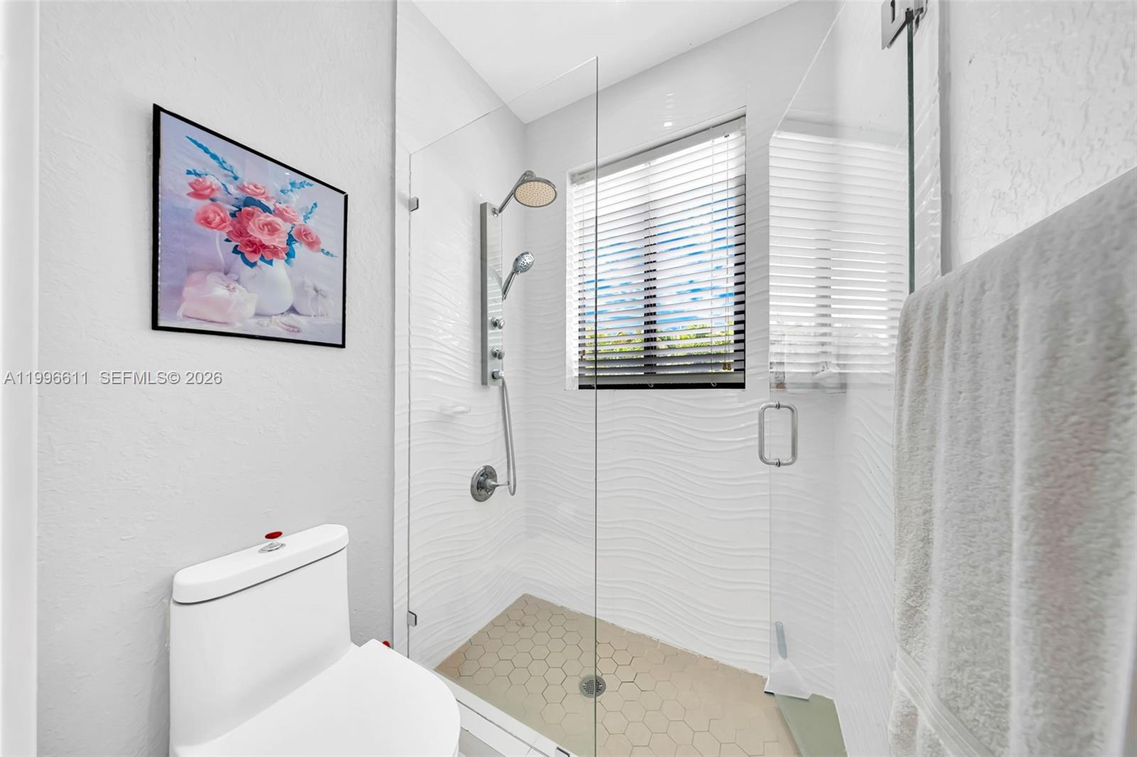 3002 Southwest 147th Court Miami, FL 33185 - Photo 96 of 97 a bathroom with a toilet and a shower