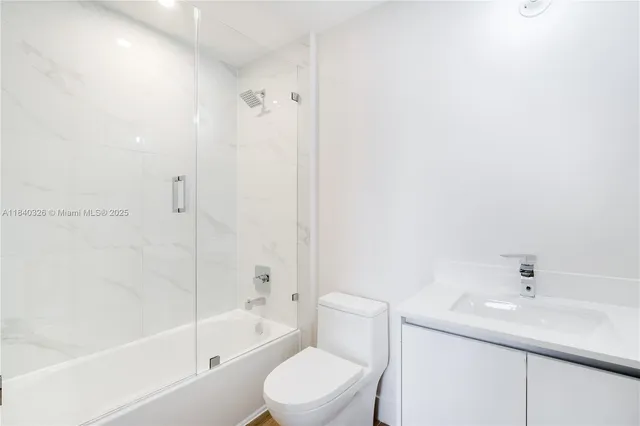 a view of a house with swimming pool and sitting area