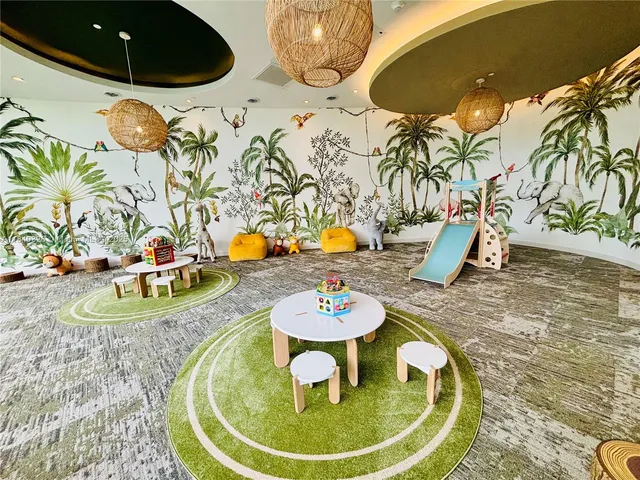 a view of a swimming pool with an outdoor seating space