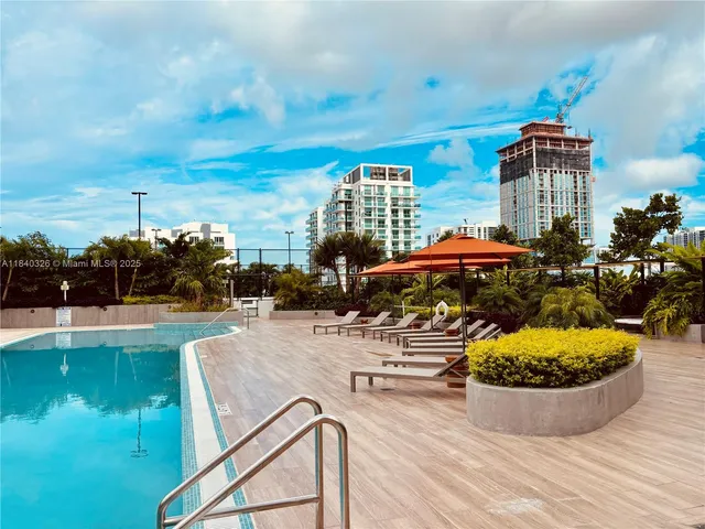 a view of a balcony with city view
