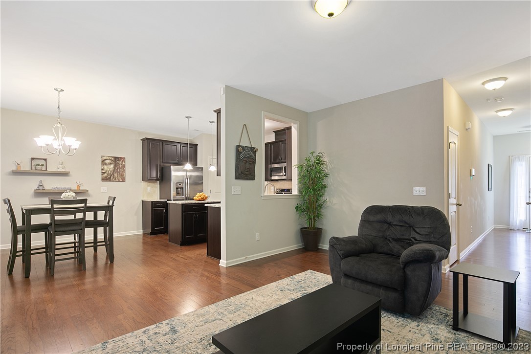 233 Blue Bay Lane Cameron, NC 28326 - Photo 14 of 50 a living room with furniture and wooden floor