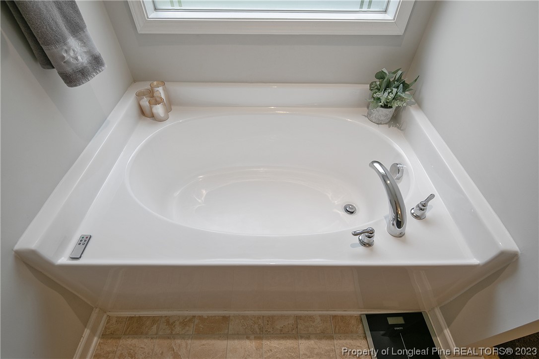 233 Blue Bay Lane Cameron, NC 28326 - Photo 31 of 50 a bath tub sitting in a bathroom