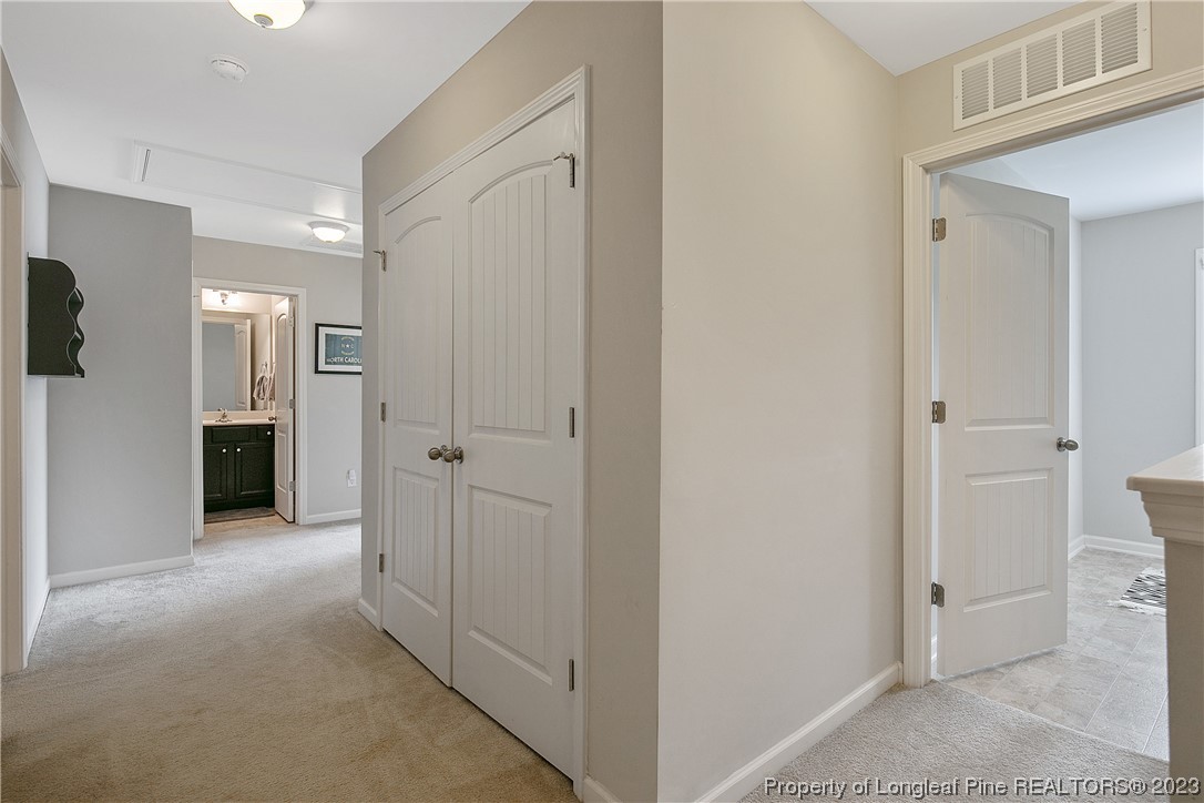 233 Blue Bay Lane Cameron, NC 28326 - Photo 42 of 50 a view of a hallway with two rooms