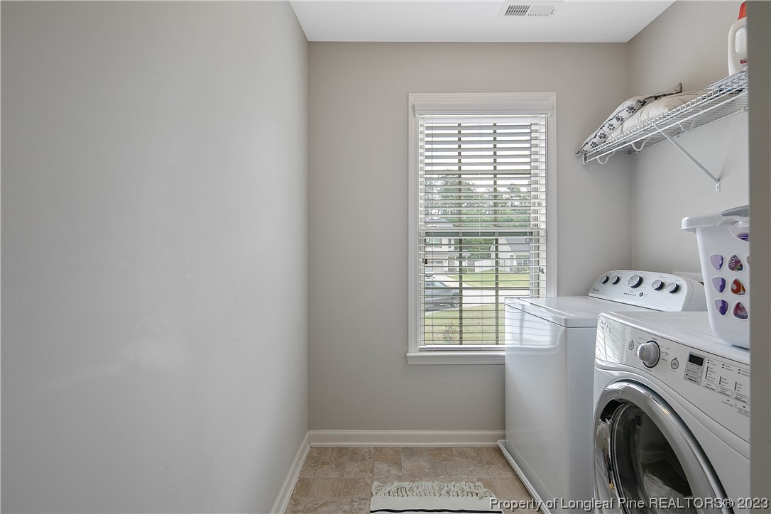 233 Blue Bay Lane Cameron, NC 28326 - Photo 43 of 50 a view of livingroom with washer and dryer