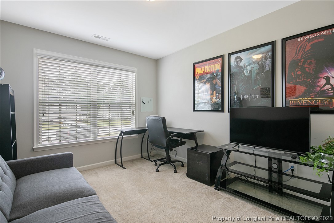 233 Blue Bay Lane Cameron, NC 28326 - Photo 44 of 50 a view of a livingroom with workspace and a window