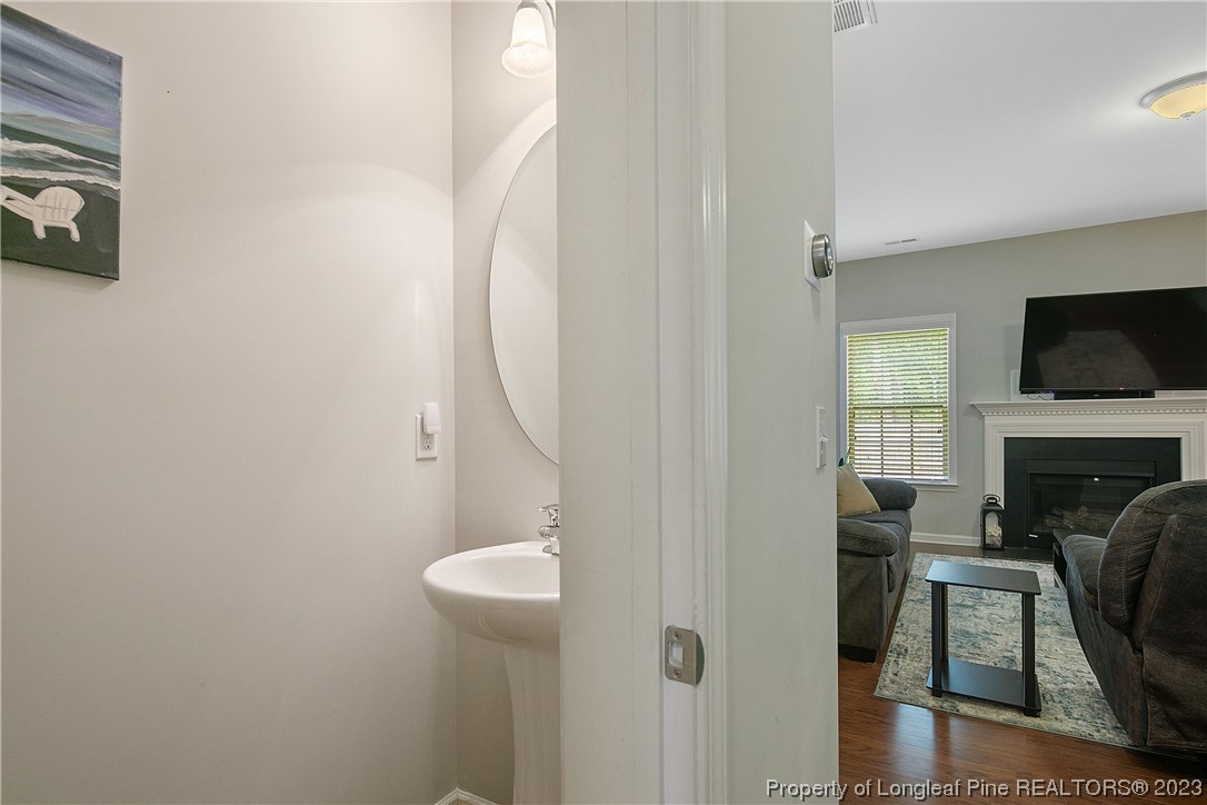 233 Blue Bay Lane Cameron, NC 28326 - Photo 8 of 50 a view of a livingroom with furniture and a fireplace