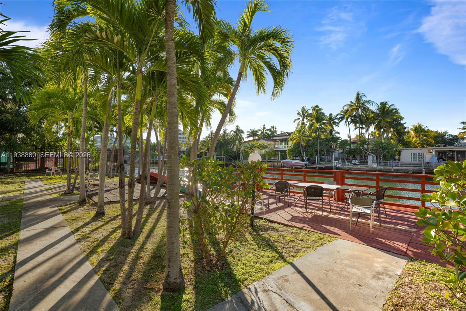 4172 Chase Avenue, Unit 3 Miami Beach, FL 33140 - Photo 23 of 29 a view of balcony with wooden floor and outdoor space
