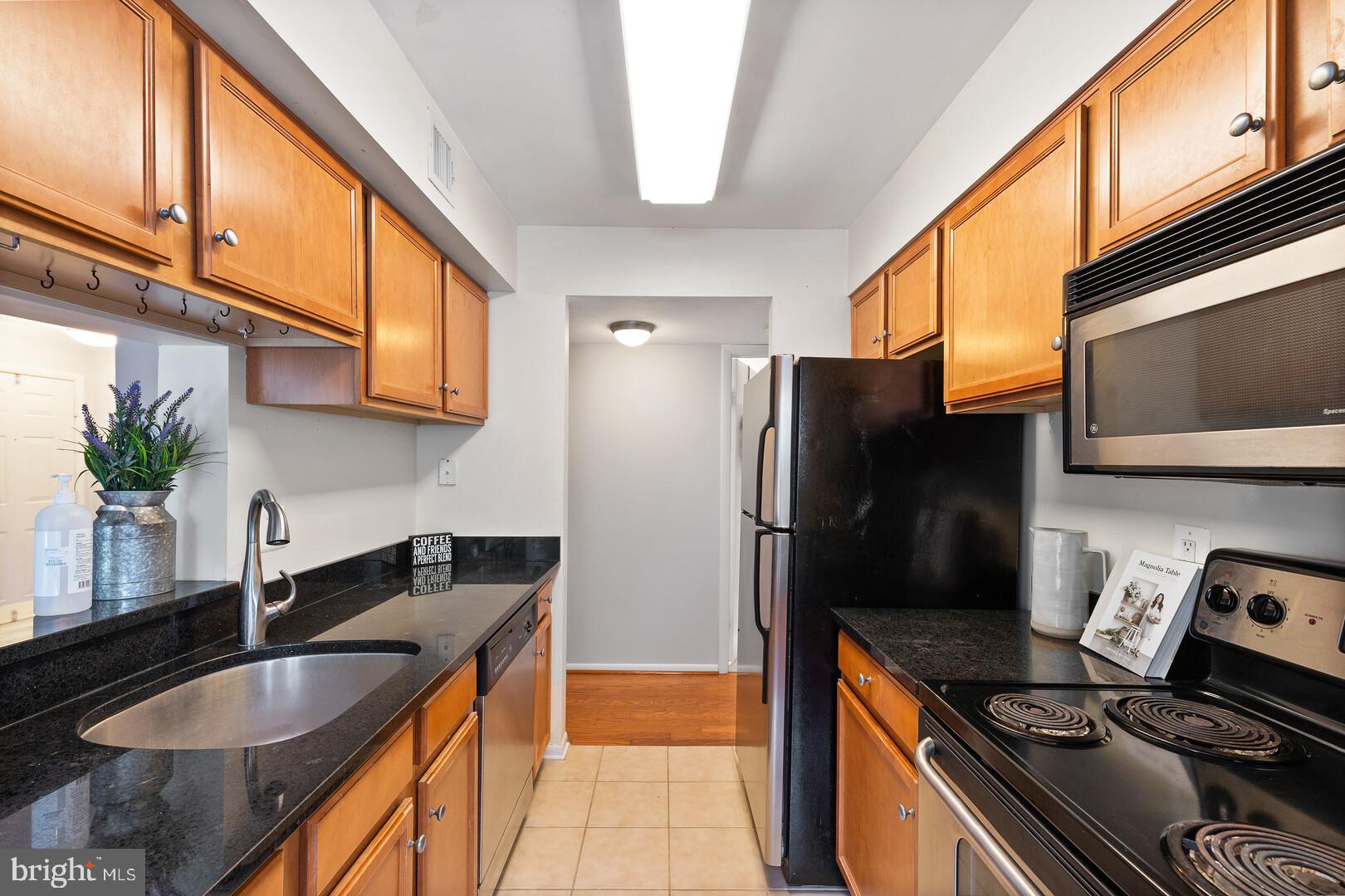 1705 Ascot Way, Unit B Reston, VA 20190 - Photo 11 of 24 Kitchen with Stainless Steel Appliances