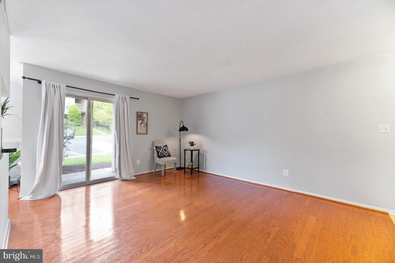 1705 Ascot Way, Unit B Reston, VA 20190 - Photo 6 of 24 Expansive Living Room- Freshly Painted