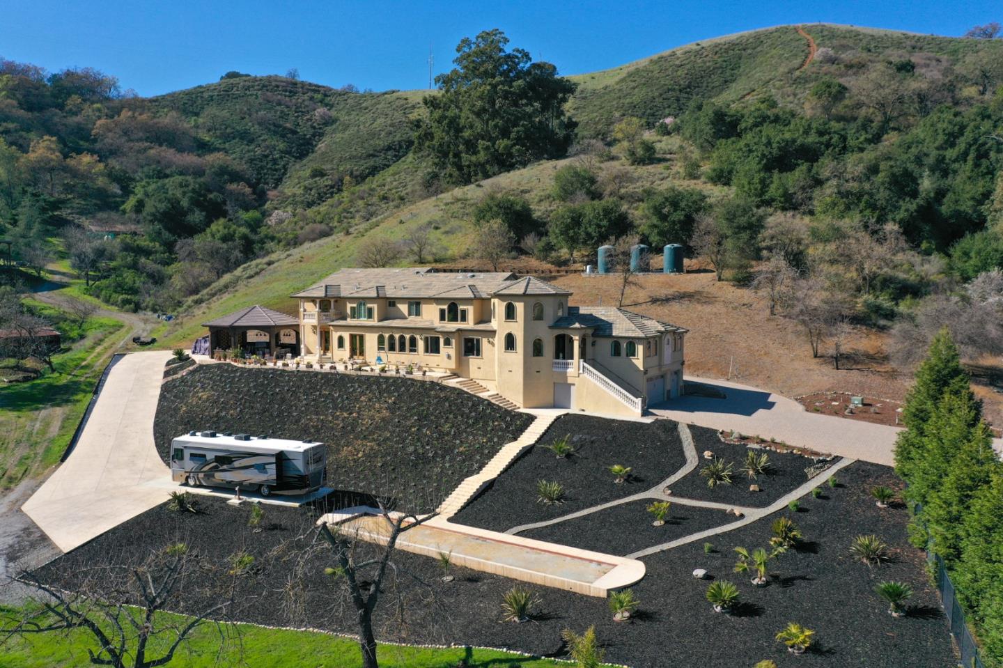 15525 Vía Eduardo Morgan Hill, CA 95037 - Photo 2 of 25 an aerial view of a house with a yard