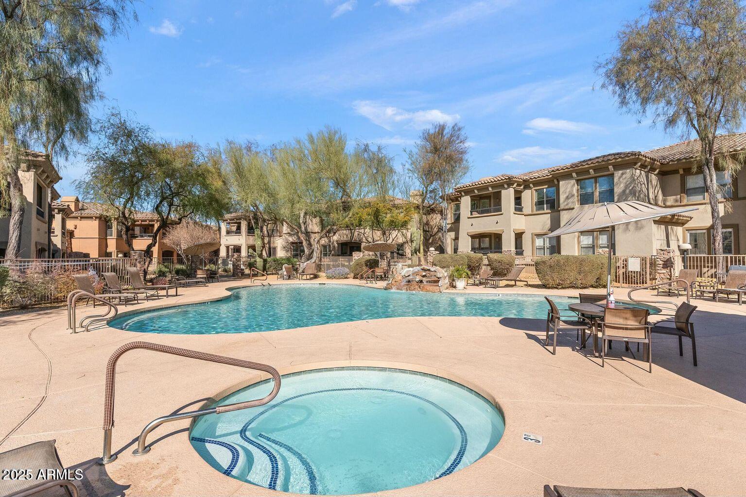 19700 North 76th Street, Unit 1008 Scottsdale, AZ 85255 - Photo 23 of 27 community pool and spa