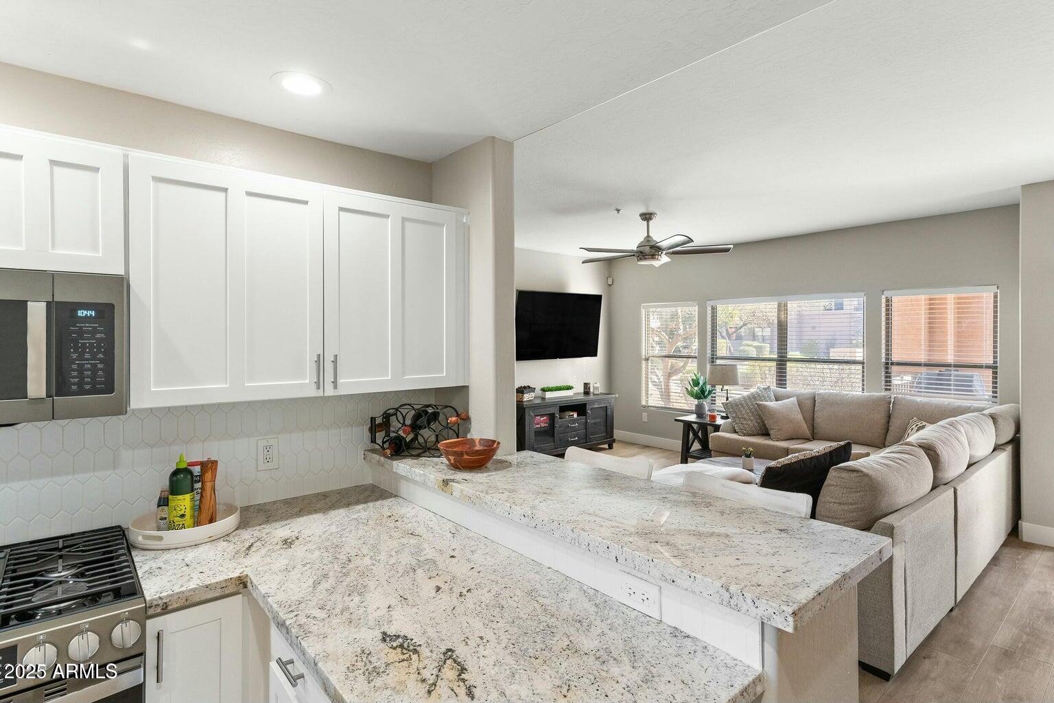 19700 North 76th Street, Unit 1008 Scottsdale, AZ 85255 - Photo 4 of 27 kitchen living room area 2