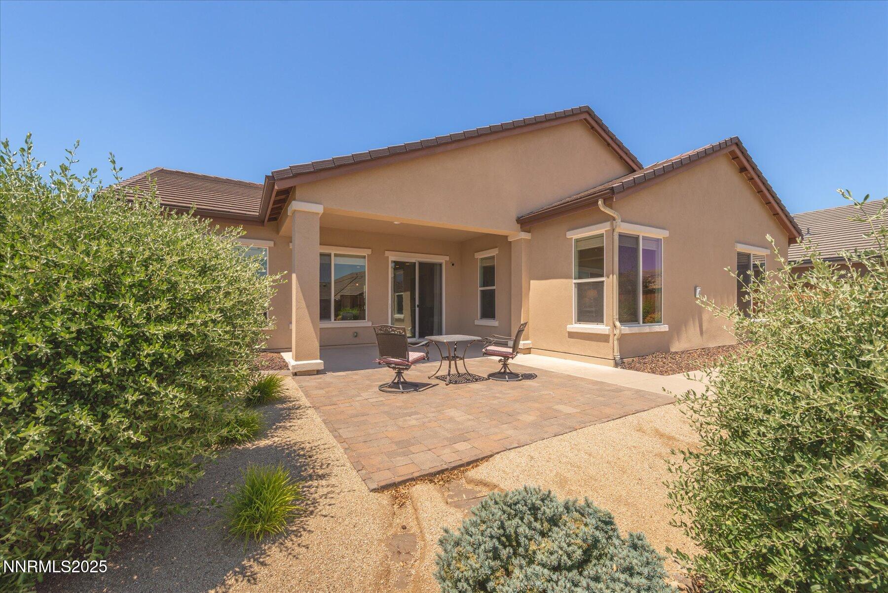 1197 Callaway Trail Reno, NV 89523 - Photo 4 of 38 a view of a house with backyard and sitting area