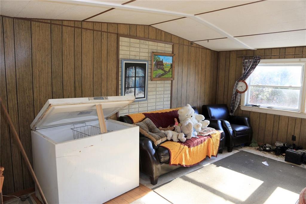 138 Old Stagecoach Road Old Town, ME 04468 - Photo 11 of 27 Deep freezer in living room included