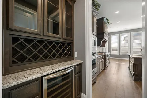 a kitchen with a stove and a microwave