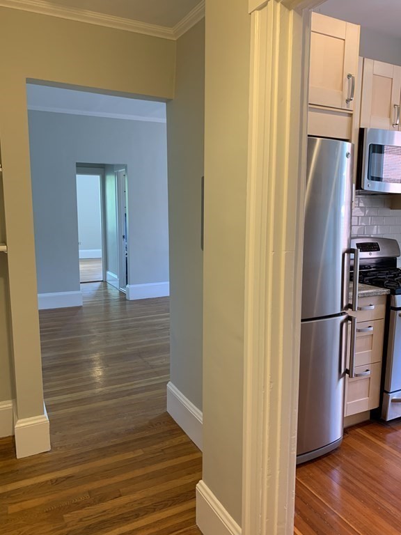 38 Kilsyth Road, Unit 33 Brookline, MA 02445 - Photo 14 of 23 a view of kitchen with furniture and refrigerator