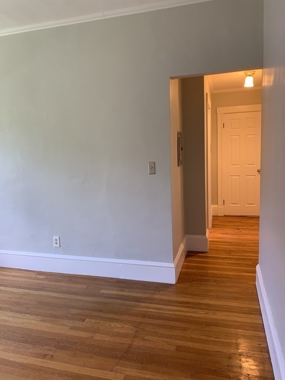 38 Kilsyth Road, Unit 33 Brookline, MA 02445 - Photo 16 of 23 a view of room with wooden floor
