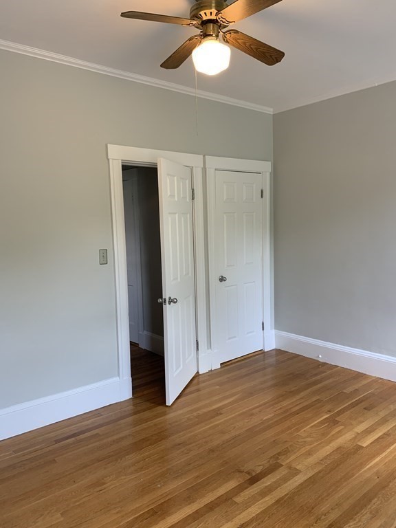 38 Kilsyth Road, Unit 33 Brookline, MA 02445 - Photo 18 of 23 wooden floor in an empty room