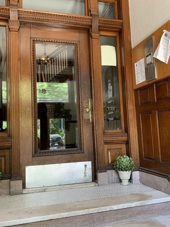 38 Kilsyth Road, Unit 33 Brookline, MA 02445 - Photo 3 of 23 a view of a door of the house front door