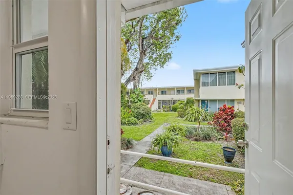 a view of a back yard of a house