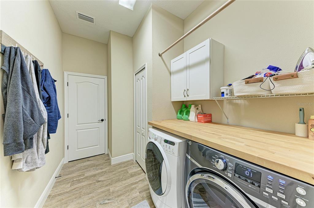 12642 Harney Street Venice, FL 34293 - Photo 42 of 85 a utility room with dryer and washer