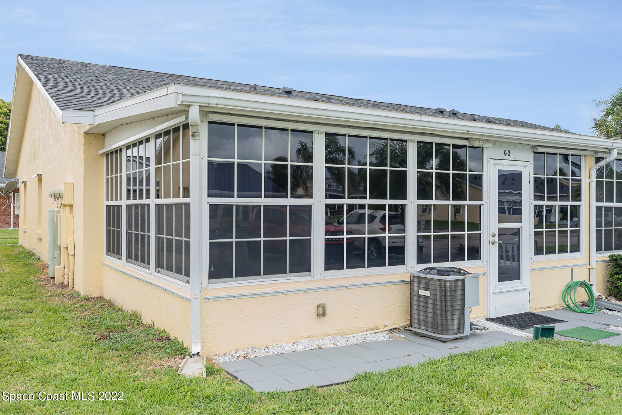 8520 Highway 1, Unit G3 Micco, FL 32976 - Photo 19 of 24 a view of front a house with a yard