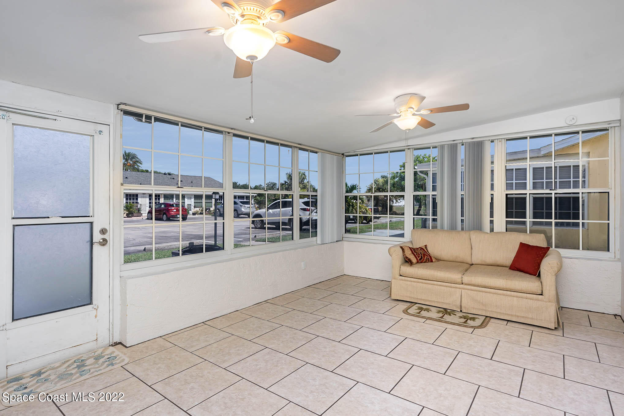 8520 Highway 1, Unit G3 Micco, FL 32976 - Photo 2 of 24 a living room with furniture and a large window