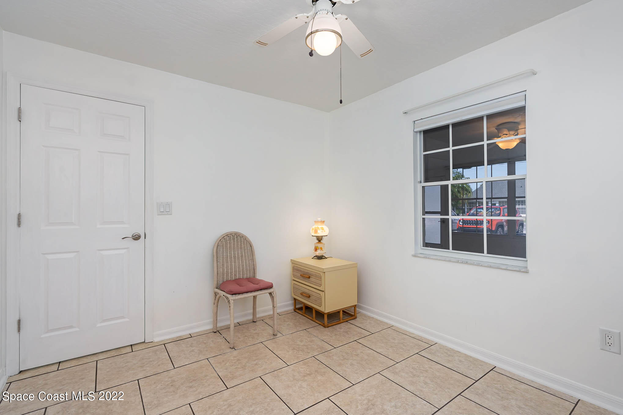 8520 Highway 1, Unit G3 Micco, FL 32976 - Photo 5 of 24 a room that has a mirror and a window in it