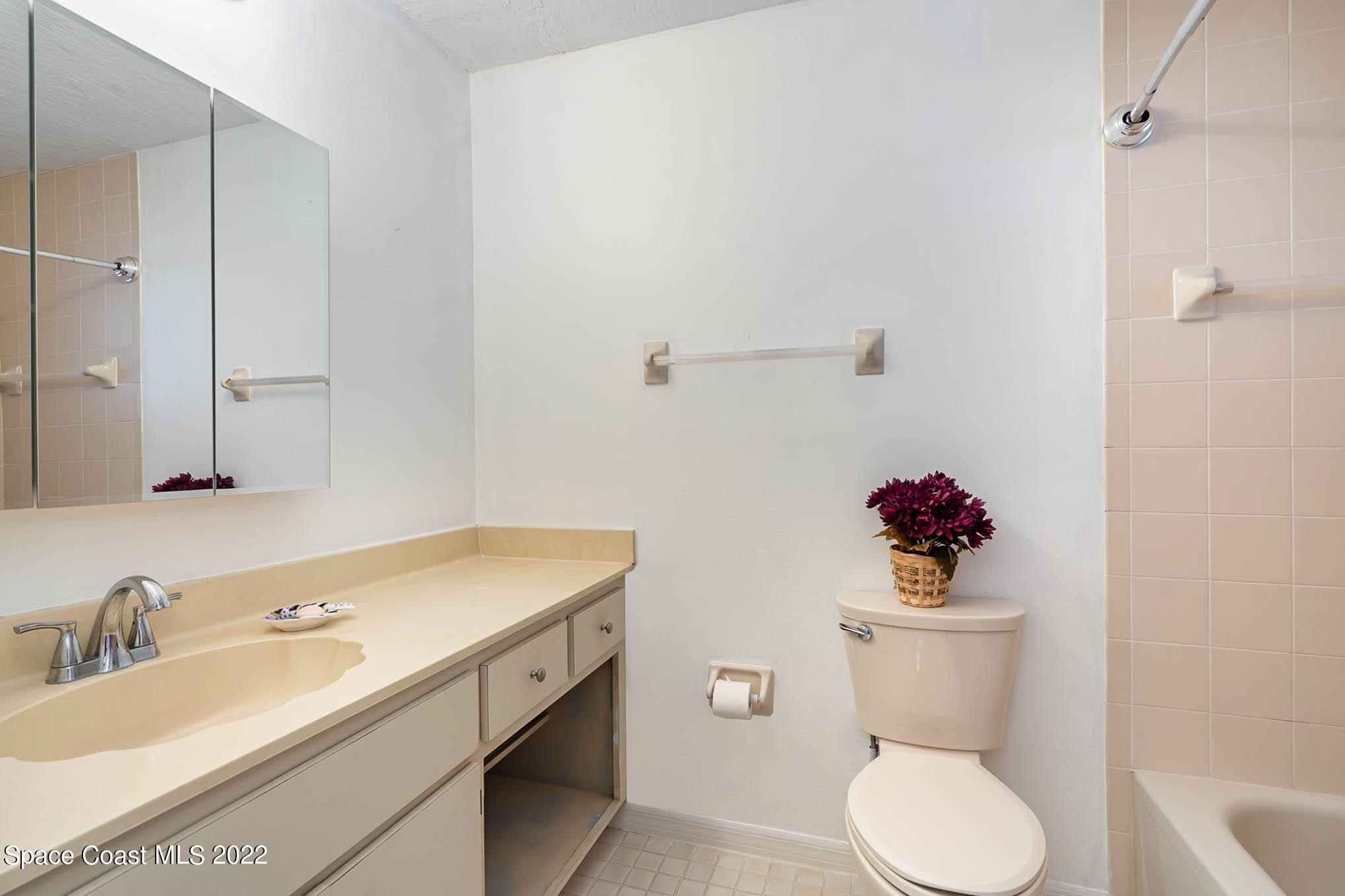8520 Highway 1, Unit G3 Micco, FL 32976 - Photo 6 of 24 a bathroom with a sink toilet and a mirror