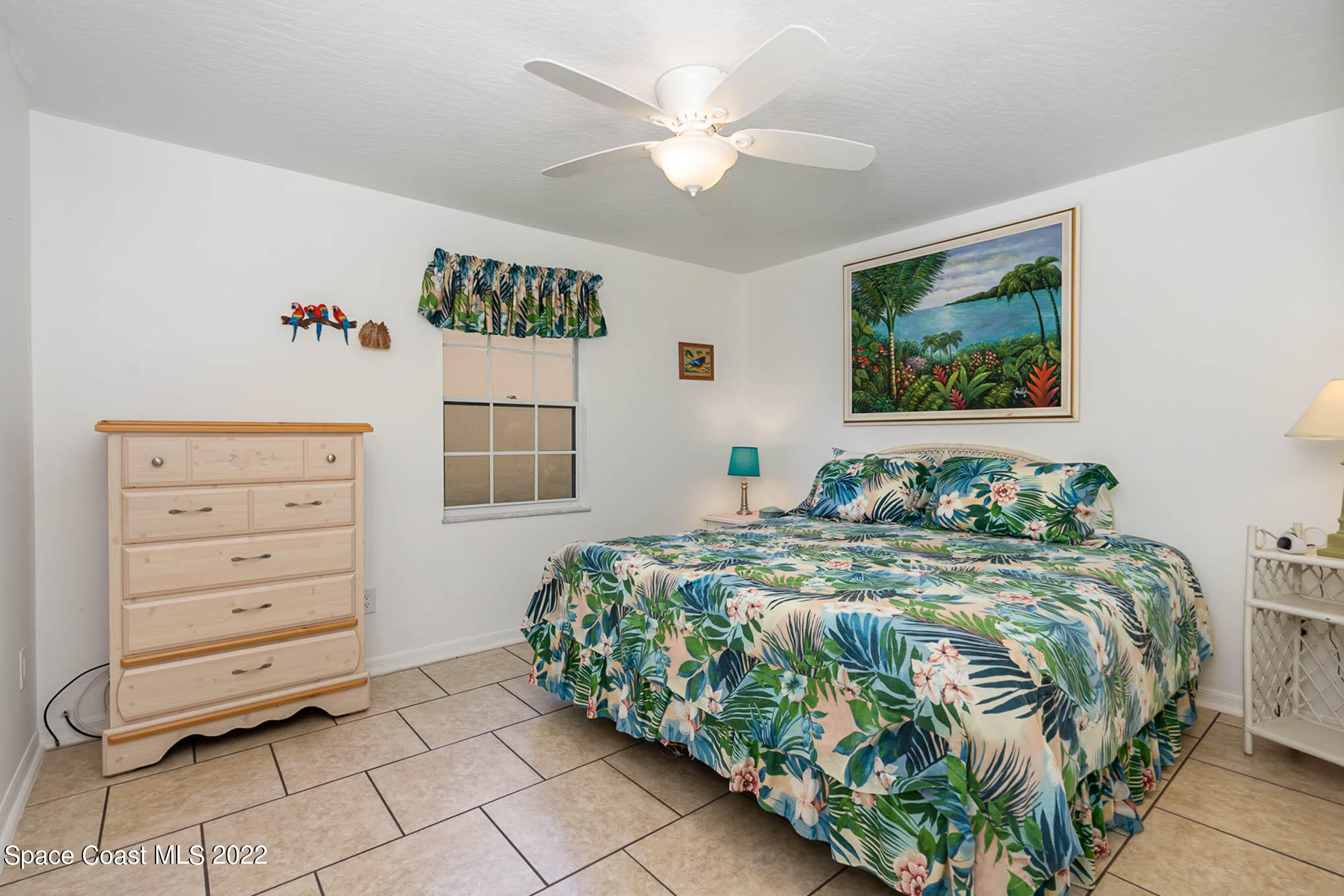8520 Highway 1, Unit G3 Micco, FL 32976 - Photo 7 of 24 a bedroom with a bed and a window
