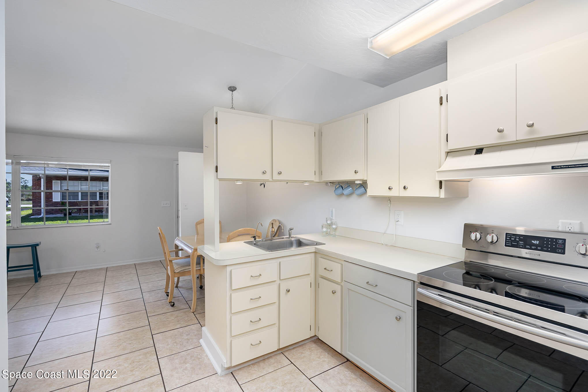 8520 Highway 1, Unit G3 Micco, FL 32976 - Photo 10 of 24 a kitchen with a cabinets and appliances