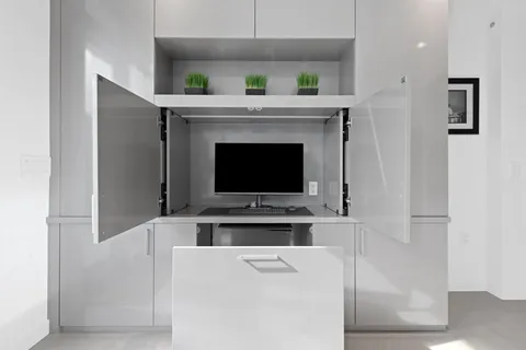 a kitchen with a stove and a refrigerator