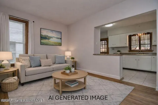 a living room with furniture and a table