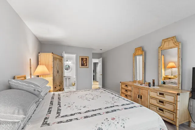a view of hallway with wooden floor