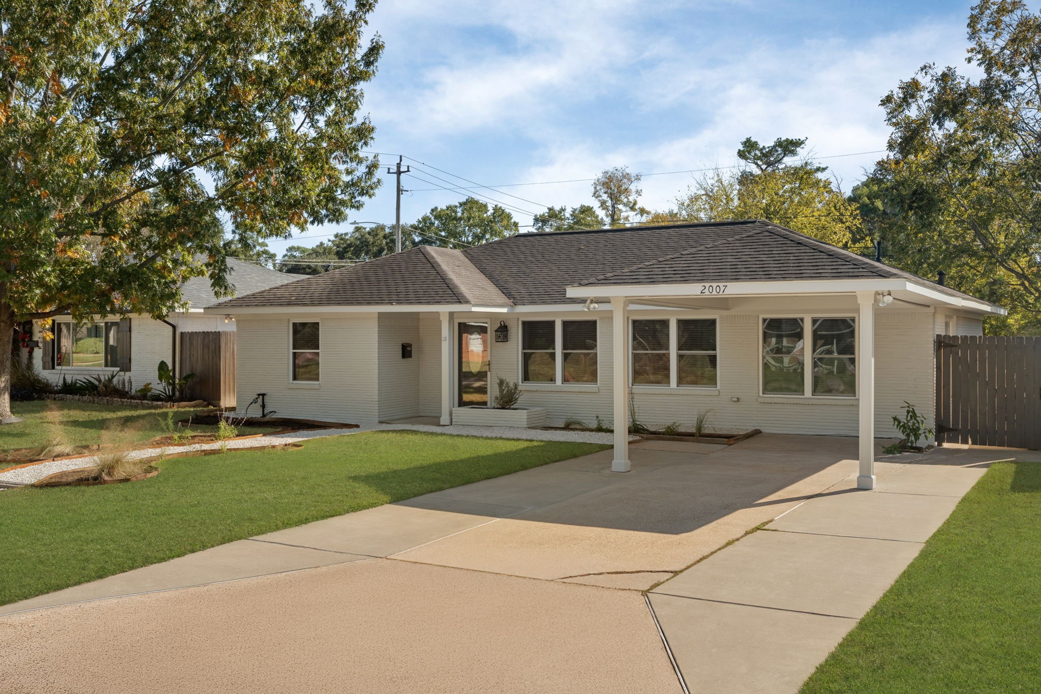 2007 Wakefield Drive Houston, TX 77018 - Photo 2 of 29 Welcome to 2007 Wakefield, a charming single-story home that feels warm and inviting from the moment you arrive. The spacious front yard and covered parking make coming home easy and comfortable every day.