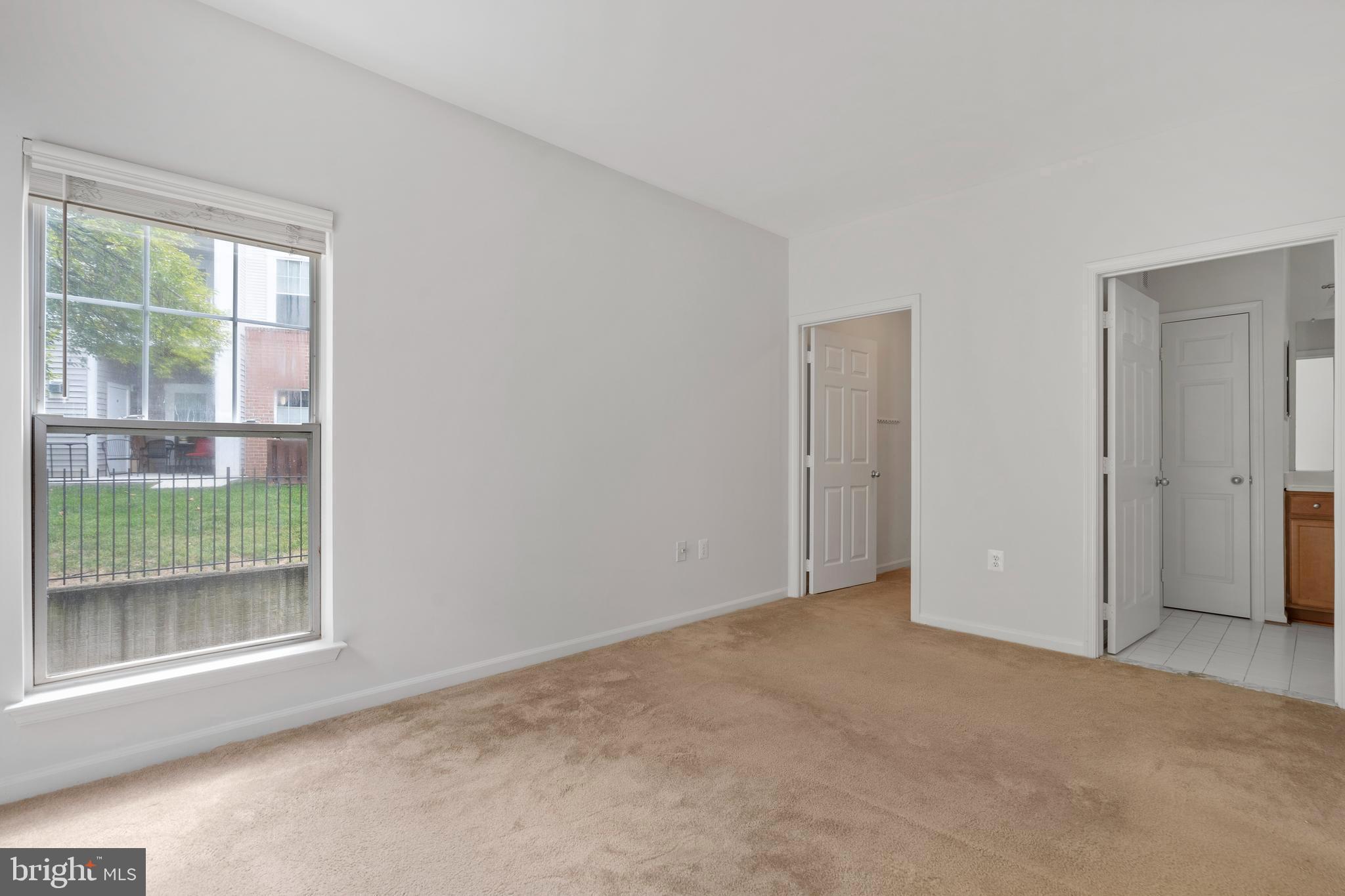 1509 North Point Drive, Unit 103 Reston, VA 20194 - Photo 15 of 33 Primary bedroom