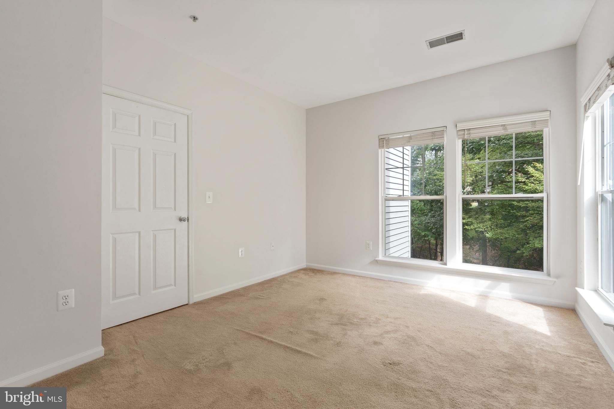 1509 North Point Drive, Unit 103 Reston, VA 20194 - Photo 16 of 33 Primary bedroom