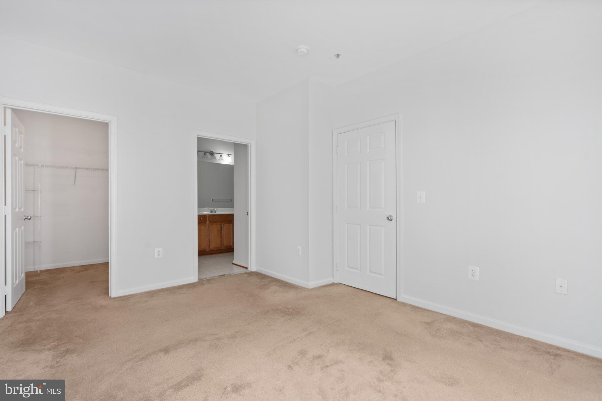 1509 North Point Drive, Unit 103 Reston, VA 20194 - Photo 17 of 33 Primary bedroom